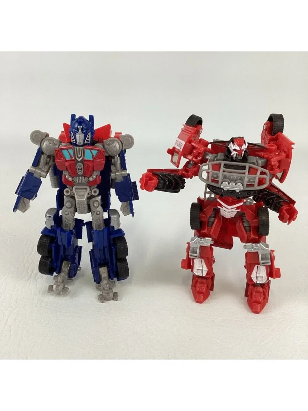 Transformers Dark Of The Moon Action Figures Ratchet Optimus Prime Autobot Toy